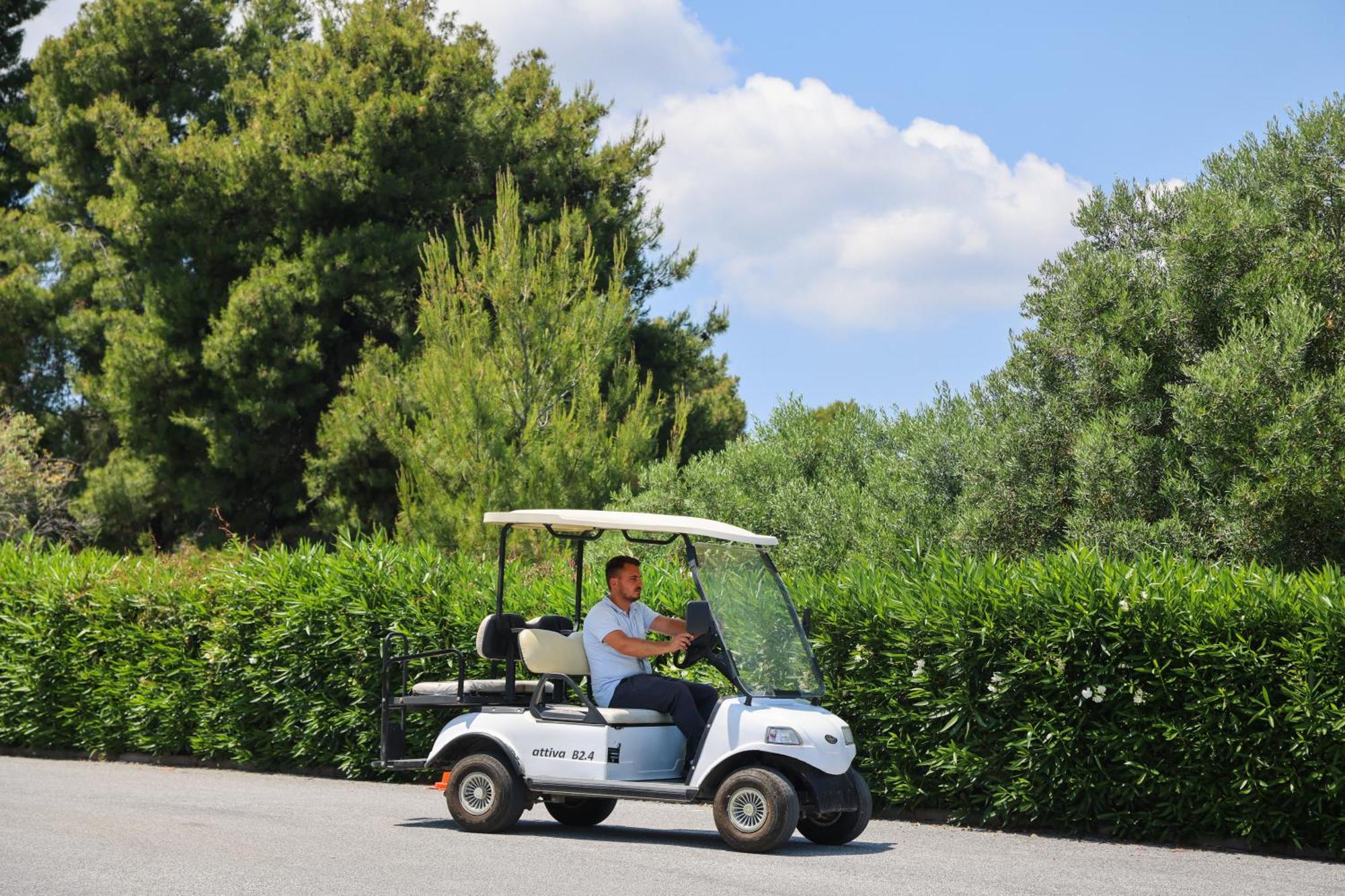 Alia Palace Hotel - Adults Only 16+ Chalkidiki ภายนอก รูปภาพ Golf cart