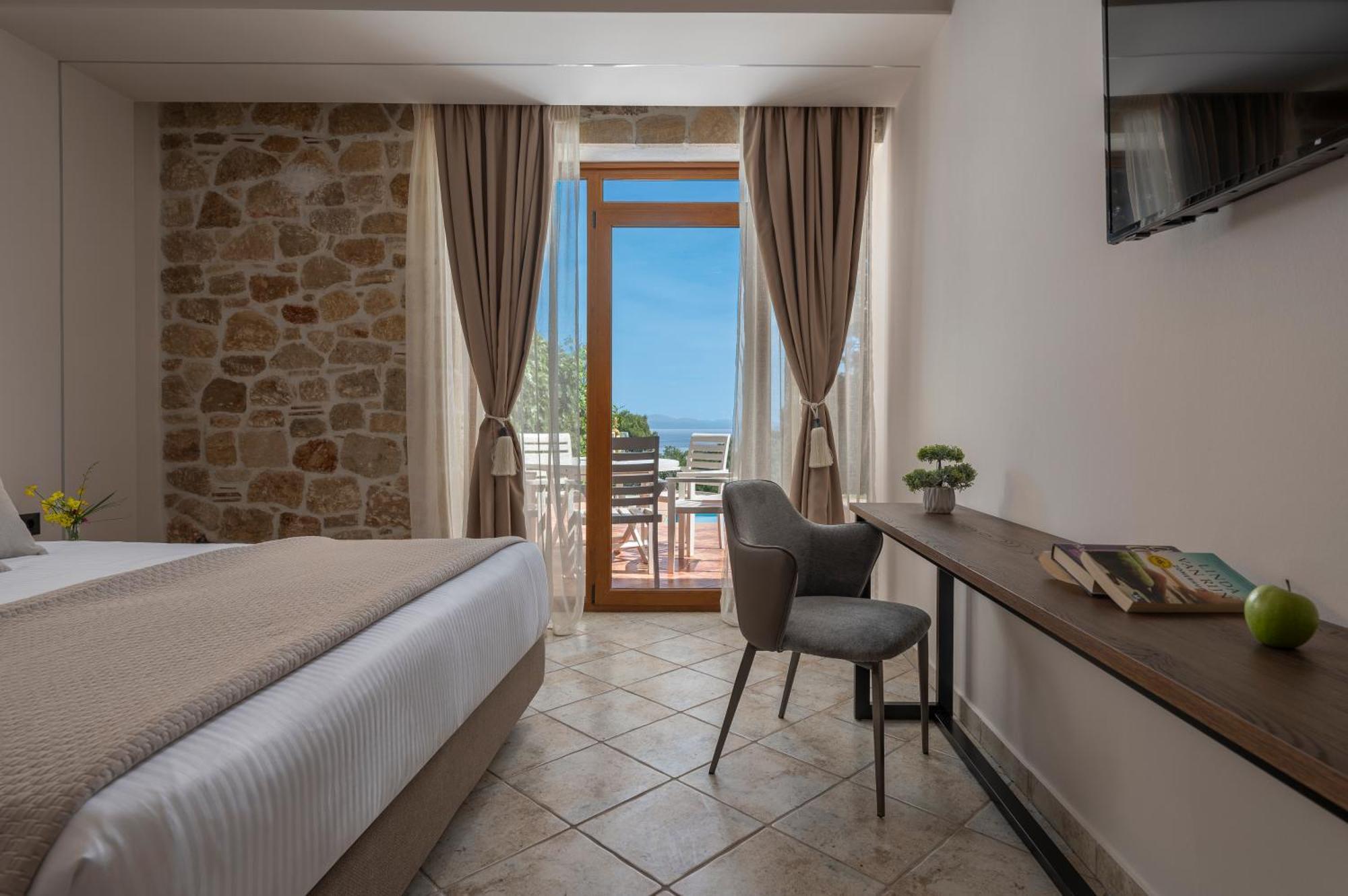 Alia Palace Hotel - Adults Only 16+ Chalkidiki ภายนอก รูปภาพ A room at the hotel