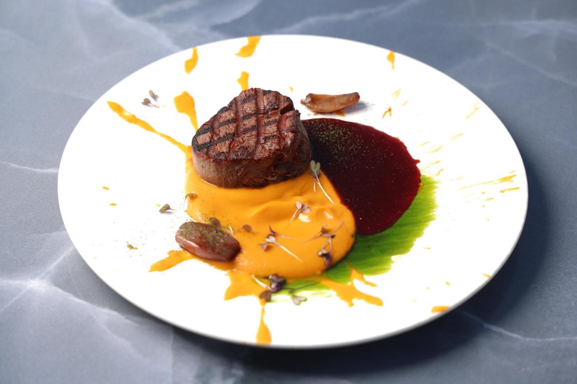 Alia Palace Hotel - Adults Only 16+ Chalkidiki ภายนอก รูปภาพ A steak with a pumpkin sauce